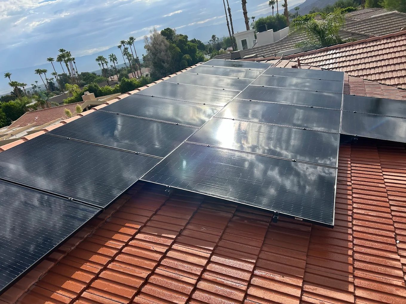 Solar panels after a Glossy pure-water clean — spotless and reflecting the sky over the Coachella Valley